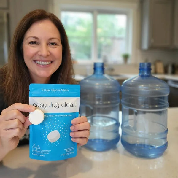 lady holding best water jug cleaner to clean her water jugs