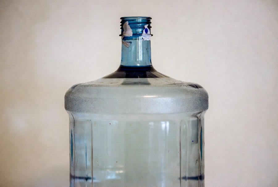 hard water stuck in 5 gallon water jug
