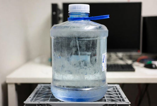5 gallon water jug damaged over time with different cleaning habits 