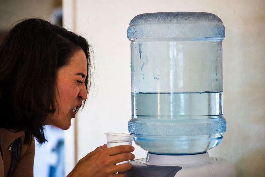5 gallon water jug cooler is not clean and tastes bad