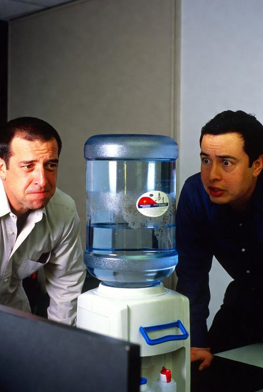 dirty 5 gallon water jug at the office on water dispenser requires cleaning
