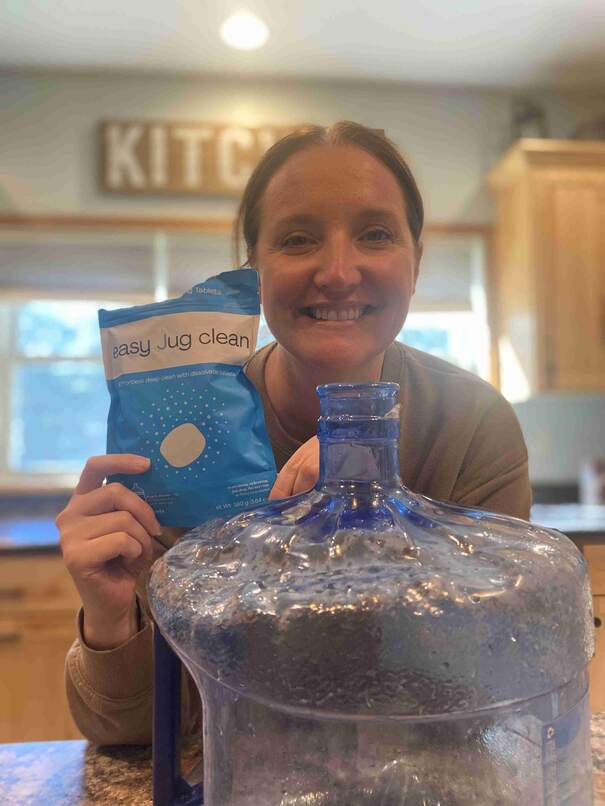 sanitizing my 5 gallon water jug with easy jug clean